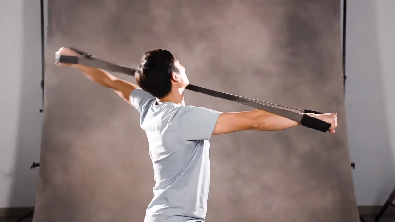 Shoulder pass-throughs build mobility without forcing range.