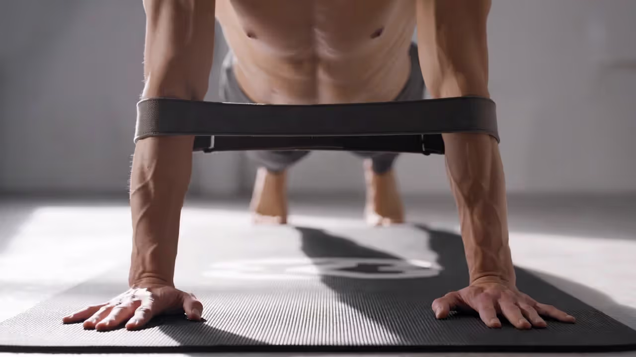 A strap can “teach” elbow width for stronger shoulder mechanics.