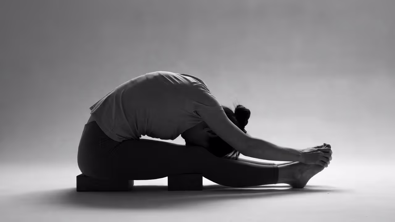 Bend your knees to keep your spine neutral in forward folds.