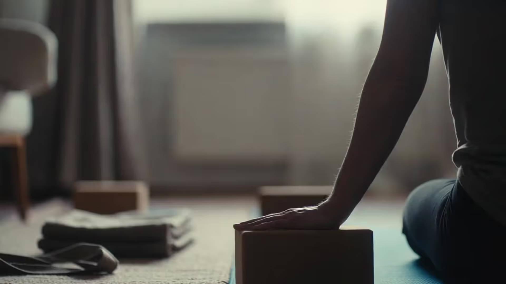 Yoga trains flexibility with breath and control—not force.