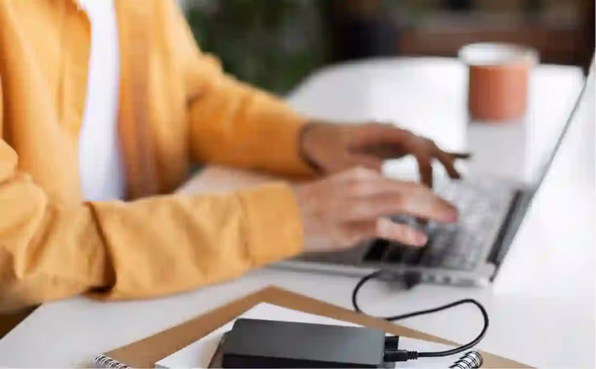 Charging a person at a computer