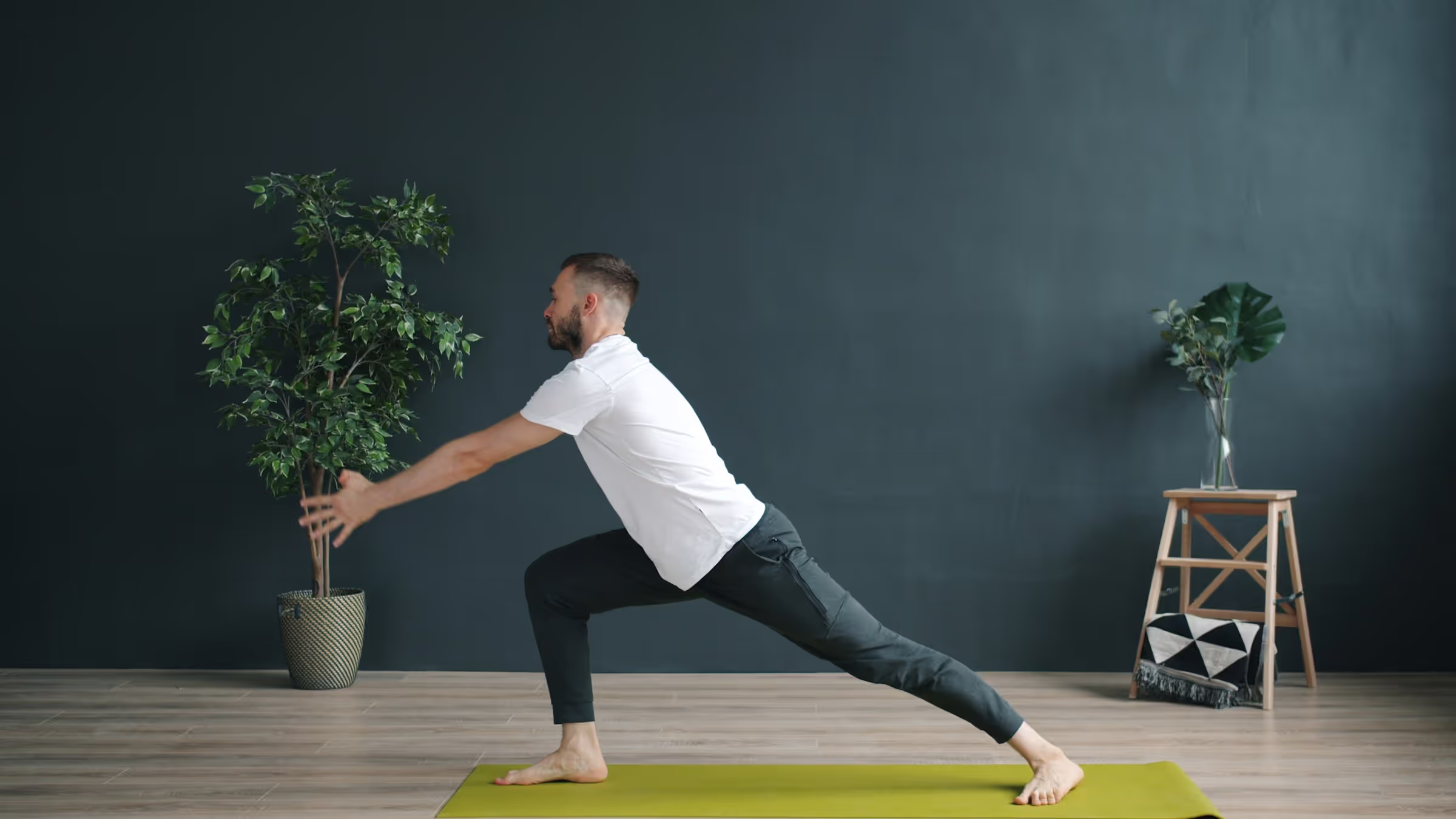 Man practicing yoga indoors