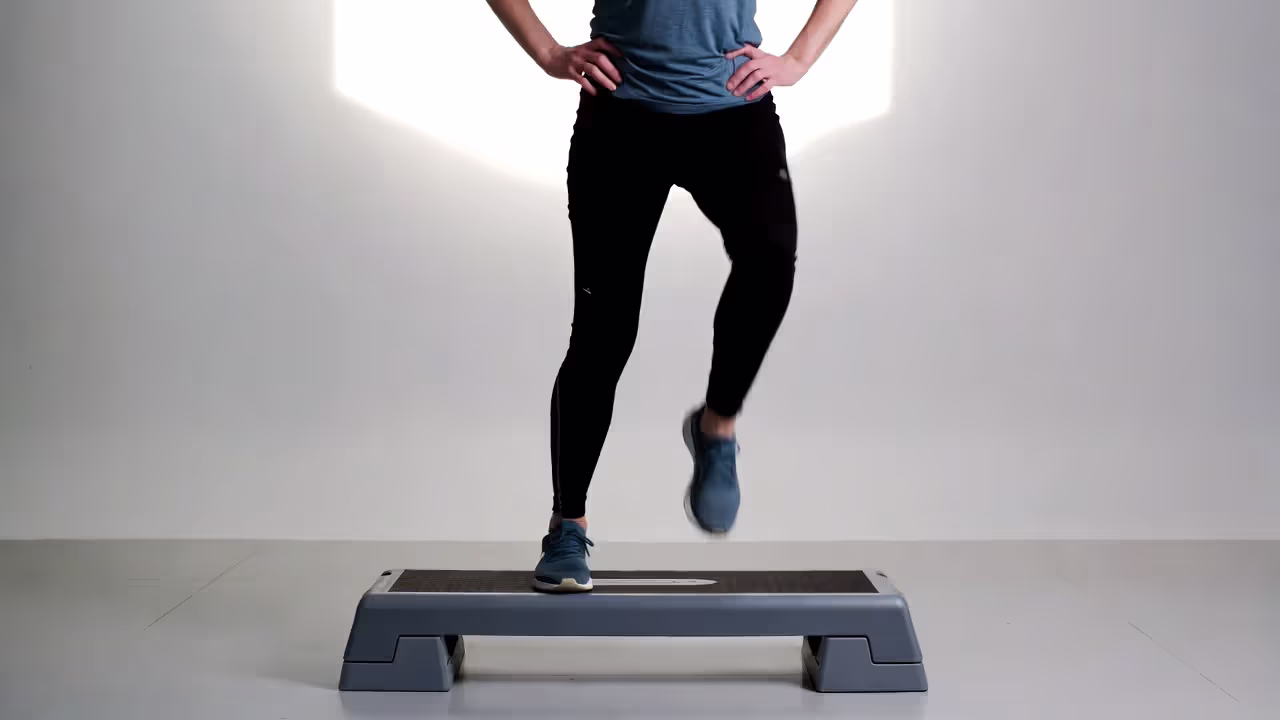 Person doing low-impact step-ups at home