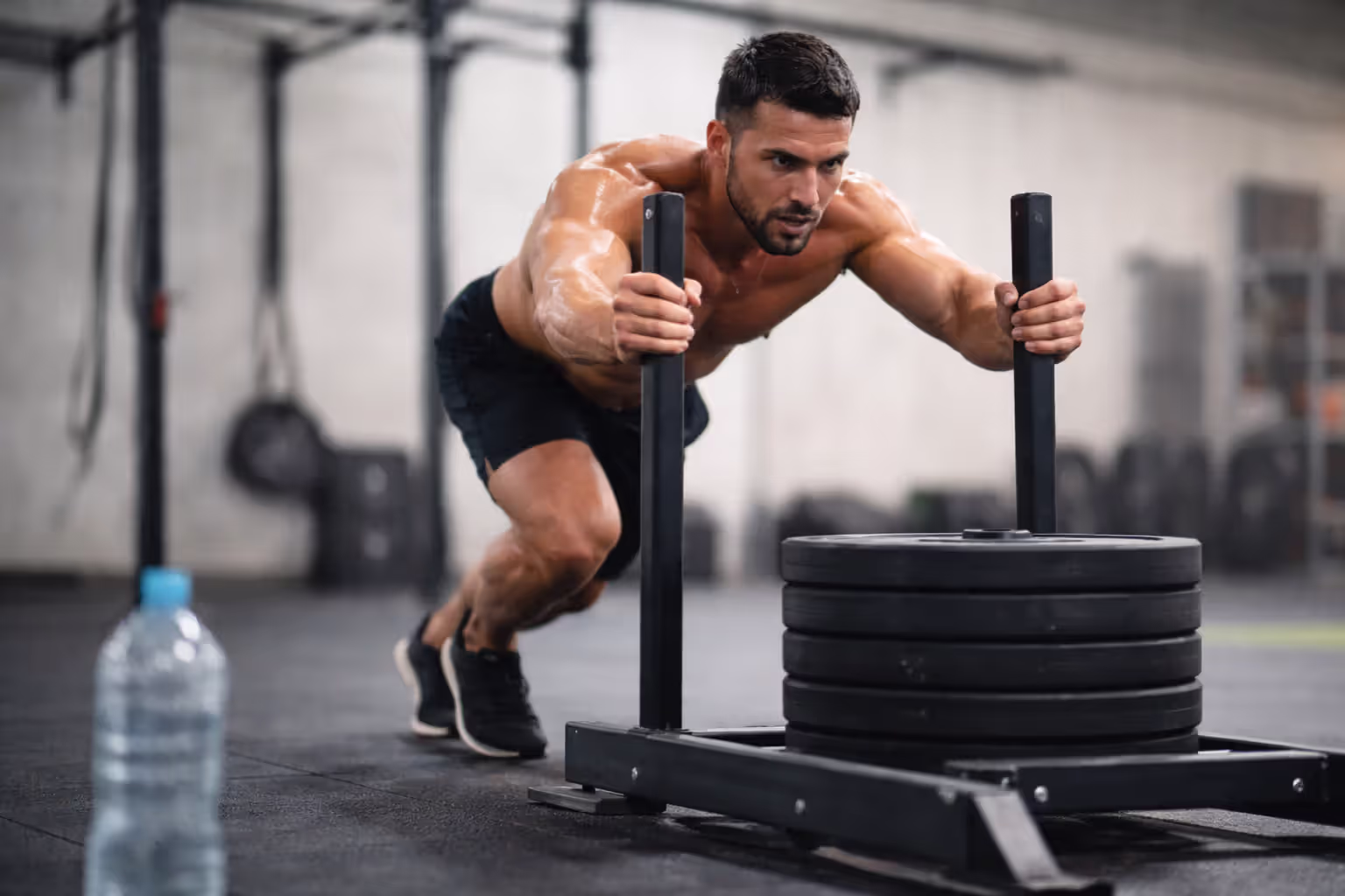 Athlete performing high-intensity interval exercise with visible effort