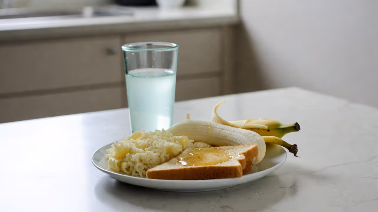 Pre-race carbohydrate-focused meal with pasta, toast, banana and sports drink